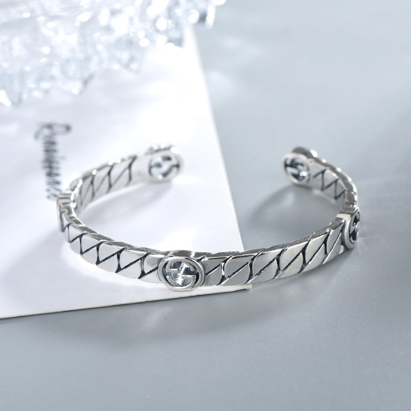 GG SILVER INTERLOCKING OPEN BRACELET