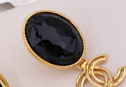 DOUBLE C GOLD BLACK DROP EARRINGS