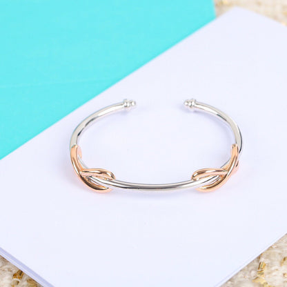 INFINITY SILVER PINK GOLD BRACELET