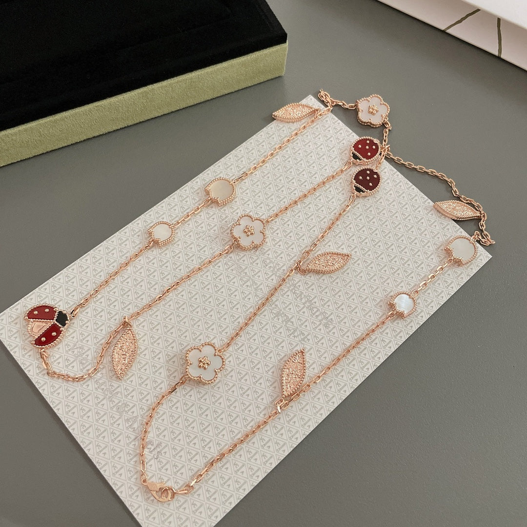 LUCKY SPRING 15 MOTIFS PINK GOLD NECKLACE