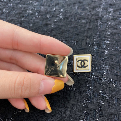 CC SQUARE GOLD BLACK STUD EARRINGS