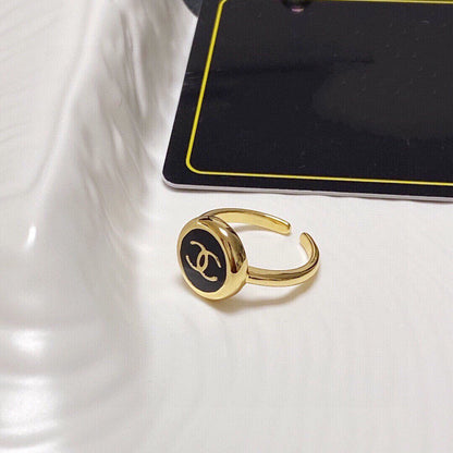 CC GOLD BLACK ENAMEL OPEN RING