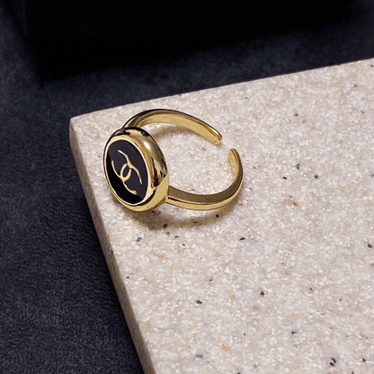 CC GOLD BLACK ENAMEL OPEN RING