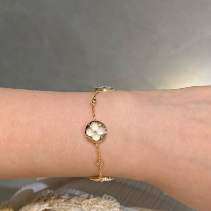 STAR AND SUN 4 MOTIF WHITE MOP PINK GOLD BRACELET