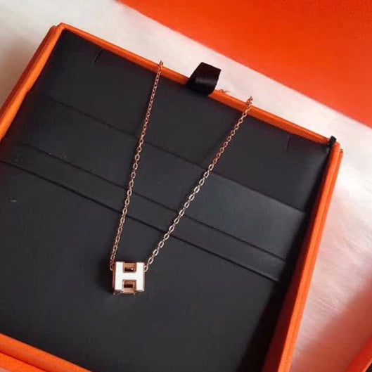 H WHITE SQUARE PINK GOLD NECKLACE