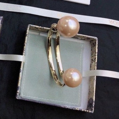 DIO TRIBALES BANGLE GOLD AND PEARL PINK BRACELET