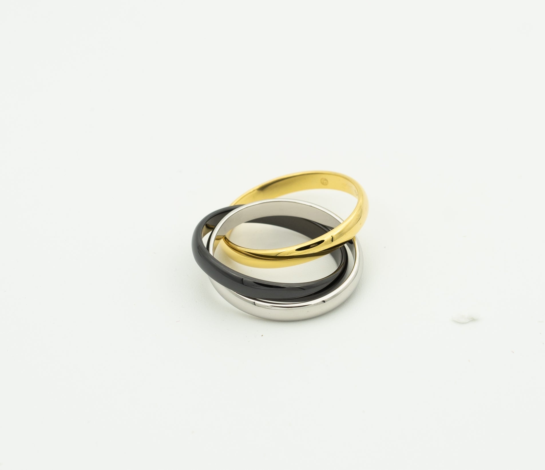 TRINITY RING BLACK GOLD SILVER