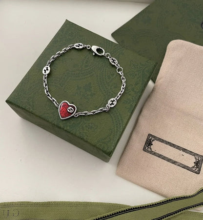 GG HEART AGED FINISH STERLING SILVER RED ENAMEL BRACELET