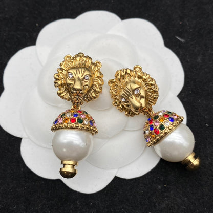 GG LION HEAD PEARL COLORED DIAMOND EARRINGS