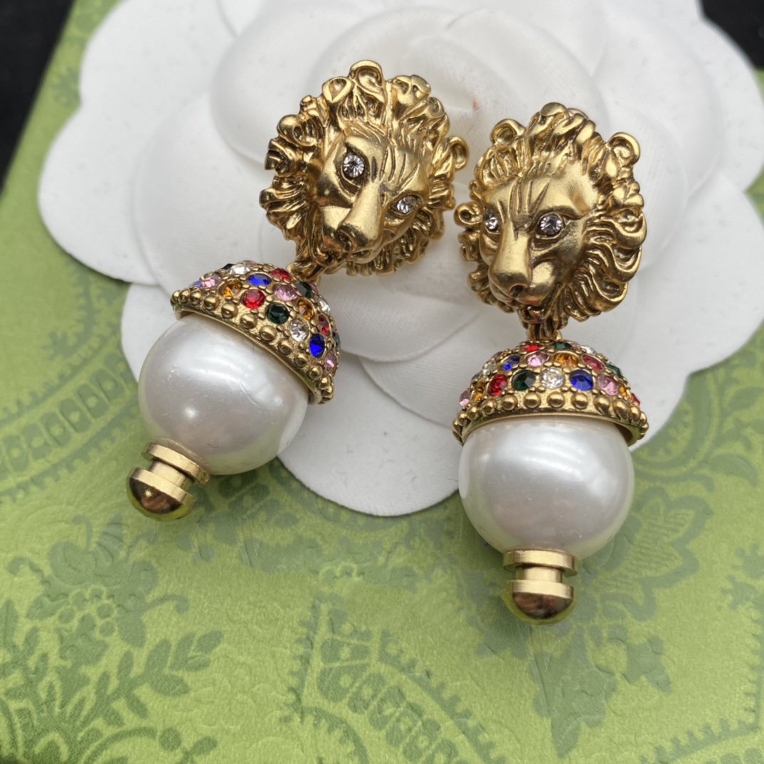 GG LION HEAD PEARL COLORED DIAMOND EARRINGS