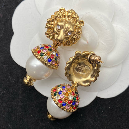 GG LION HEAD PEARL COLORED DIAMOND EARRINGS