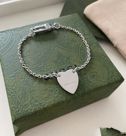 GG LOGO HEART-SHAPED PENDANT SILVER BRACELET