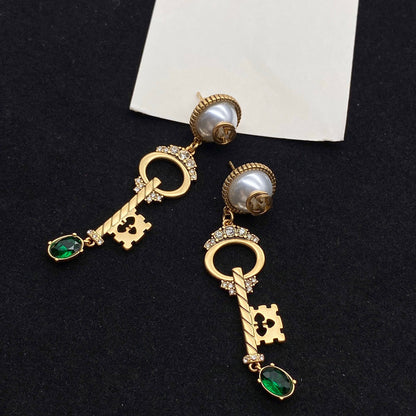 KEY SHAPED DANGLE GG EARRING