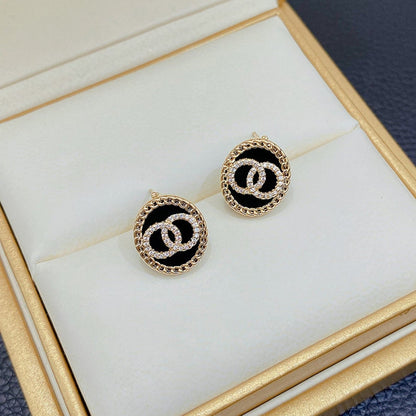 DOUBLE CIRCLE DIAMOND ONYX STUD EARRINGS