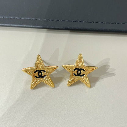 cc star black enamel stud earrings