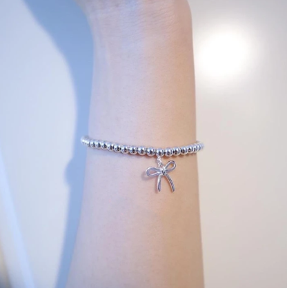 STERLING SILVER BOW BEAD BRACELET