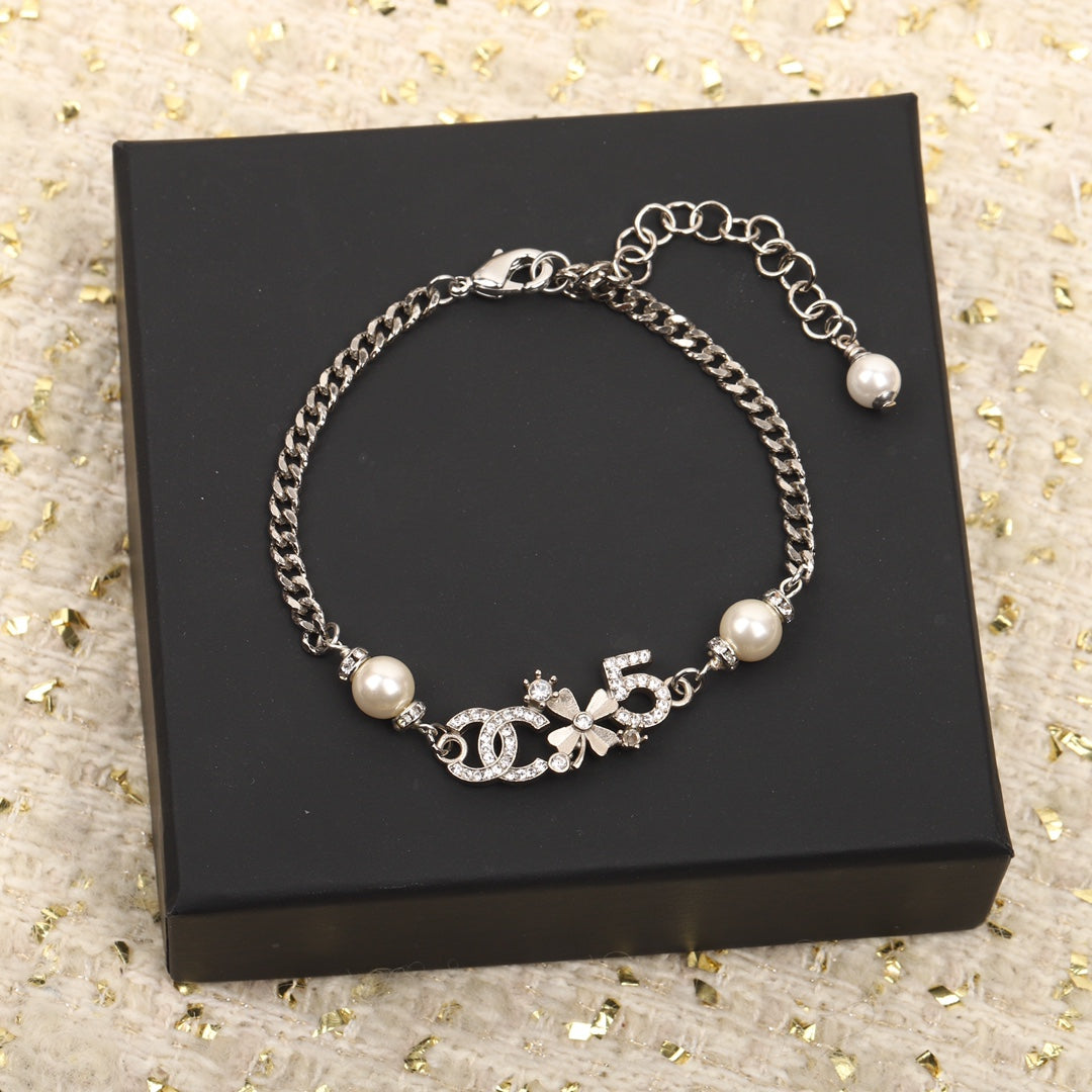 DOUBLE C MULTI-ELEMENT SILVER BRACELET