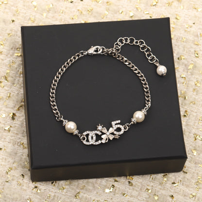 DOUBLE C MULTI-ELEMENT SILVER BRACELET