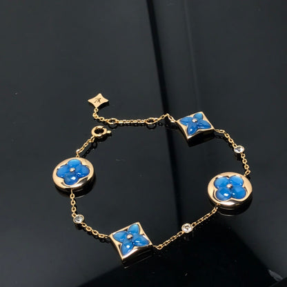 STAR AND SUN 4 MOTIF BLUE BRACELET